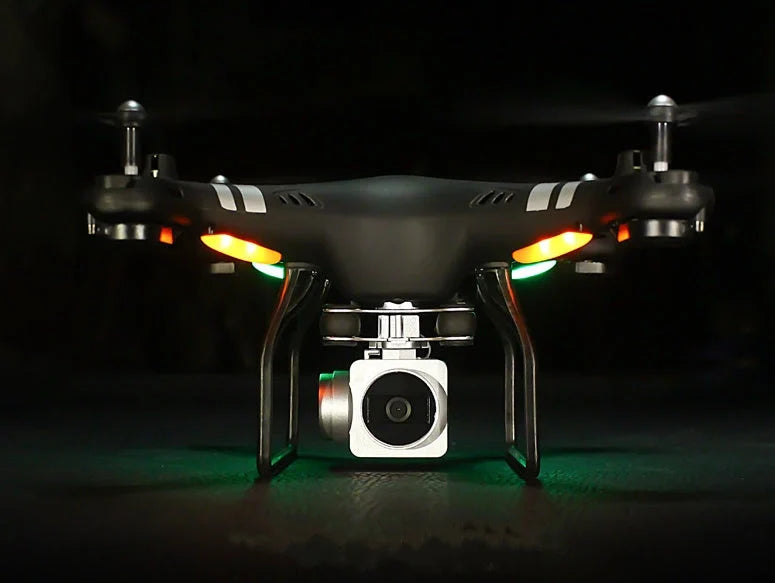 X52 UAV drone with protective frame in black colour, showing camera and bright night light