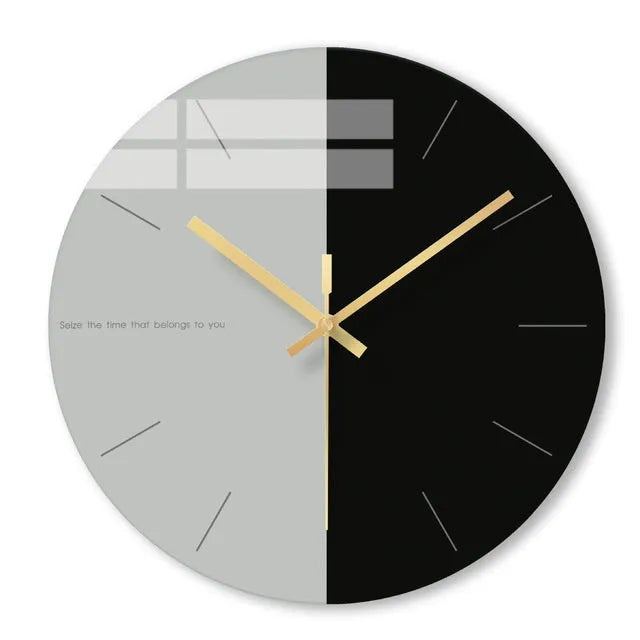 A large, clear tempered glass wall clock with a minimalist transparent face on a light background.