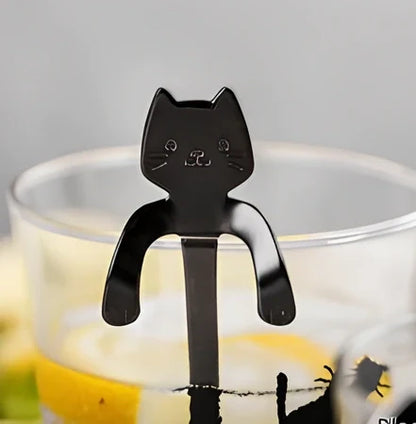 Stainless steel coffee spoon with cartoon cat handle design showing 11.7cm measurement scale