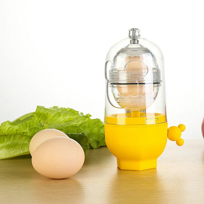 Manual egg mixer with golden egg puller for easy yolk mixing, durable PC cover, and food-grade silicone pads.