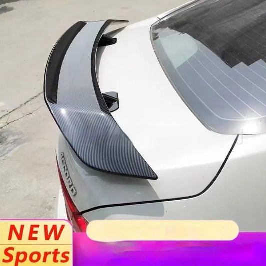 Car punch-free spoiler in ABS plastic showing adhesive mounting surface and finish options