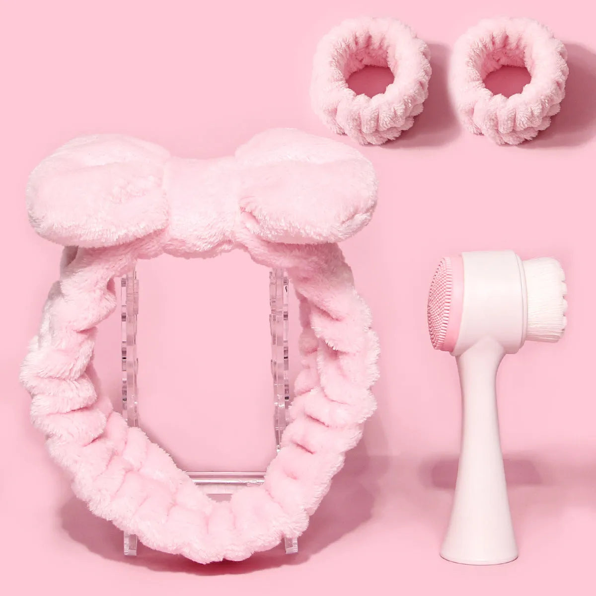 Facial brush set with coral fleece hair band and 4-count nylon brush heads in purple, gray, white, pink colours