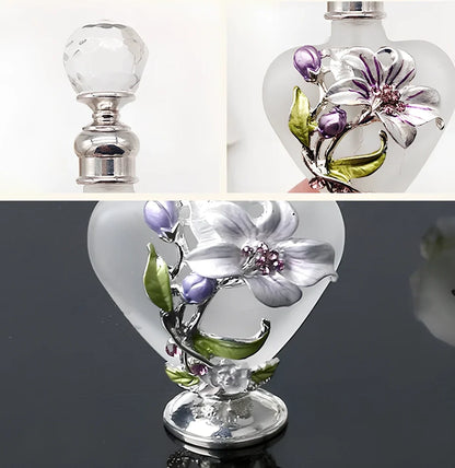 Heart-shaped refillable perfume bottle with metal and crystal construction, 3.6 inches tall
