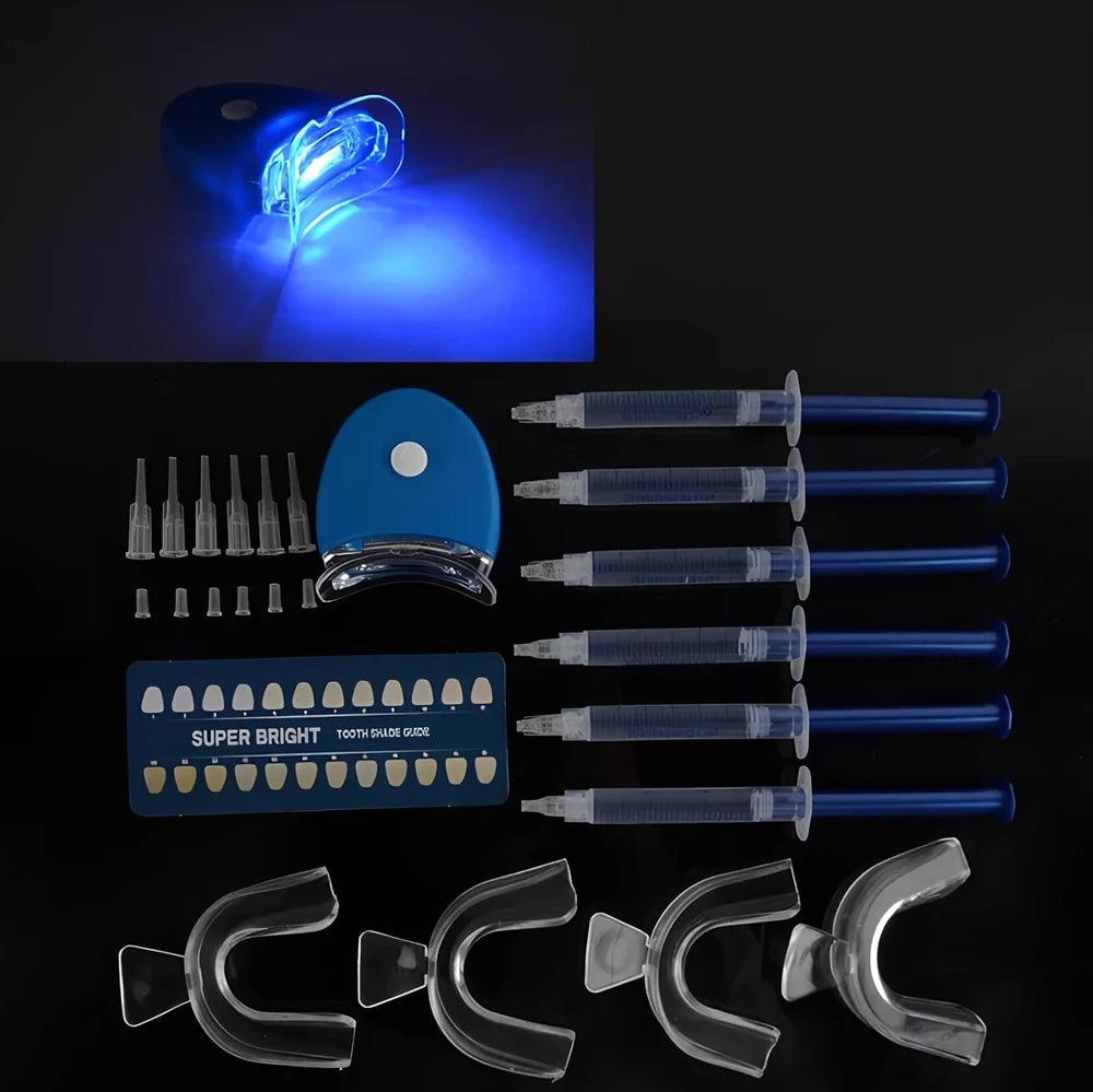 Teeth whitening gel kit with thermoform trays, cold light lamp, 10 gel syringes, and 3D shade guide showing 7-10 improvement