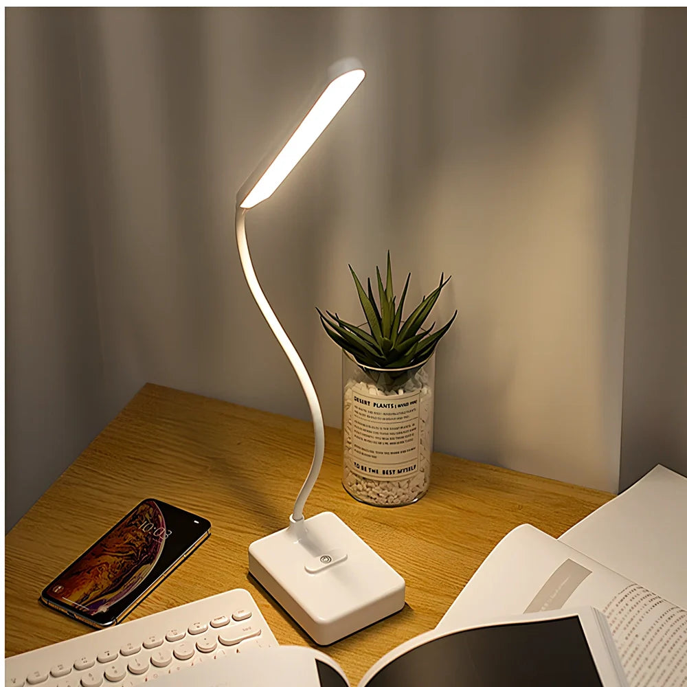 White LED desk lamp with adjustable arm and touch controls showing three colour temperature options