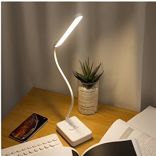 White LED desk lamp with adjustable arm and touch controls showing three colour temperature options