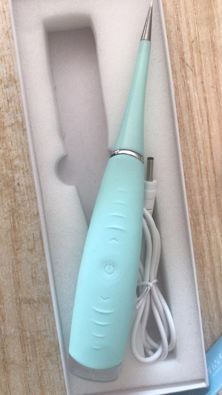 Rechargeable waterproof electric dental cleaner tool with high-frequency vibration technology for effective plaque and tartar removal