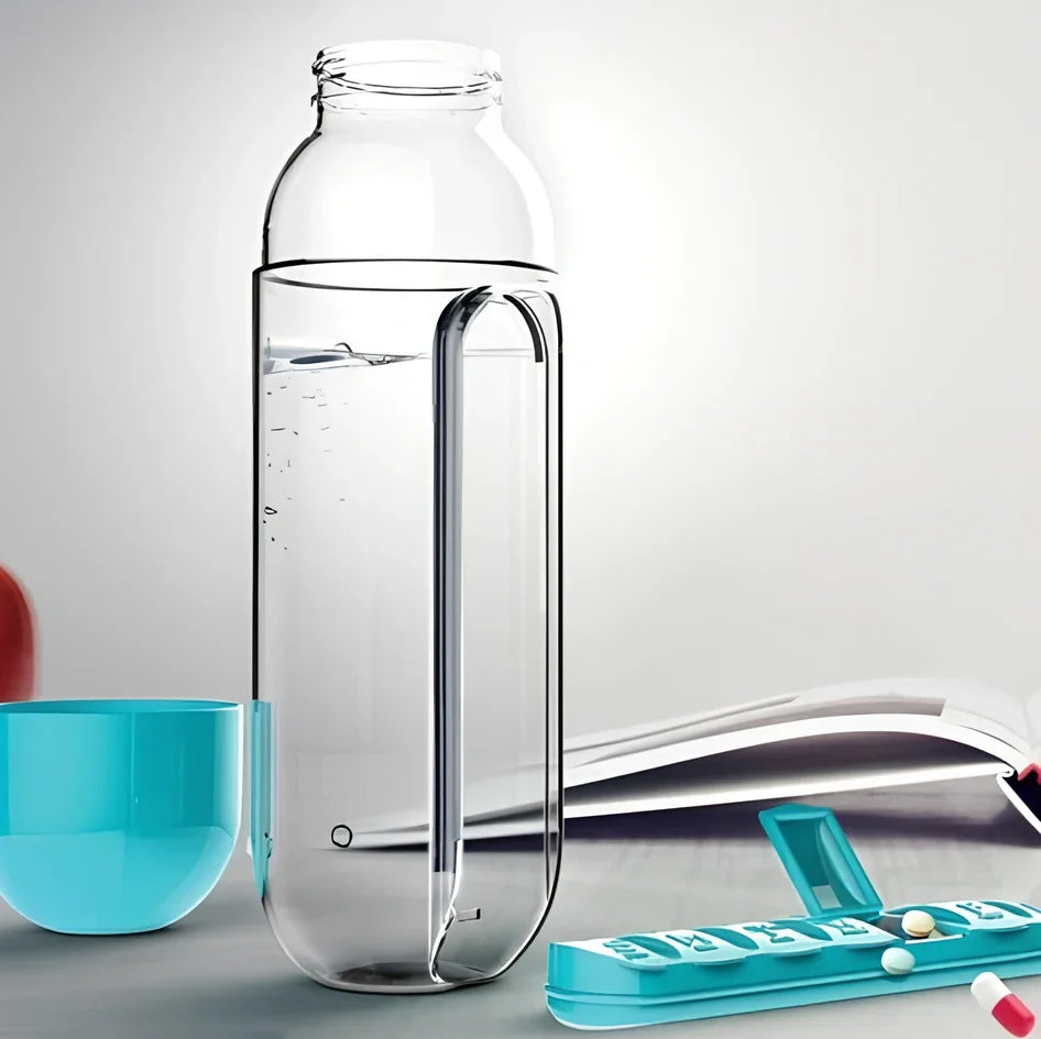 Black wrist capsule water cup showing integrated medicine compartment and safety buckle closure