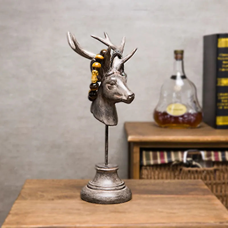 Natural resin animal sculpture home decoration in black, white, and wood colour finishes.