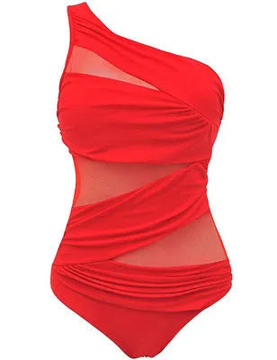 Women's plus size one-piece swimsuit in solid colour nylon with chest pad, available in black, blue, and red, sizes M to 4XL.