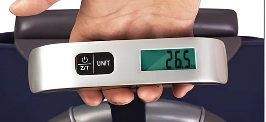 Black T-shaped electronic scales with backlit LCD display showing weight measurement