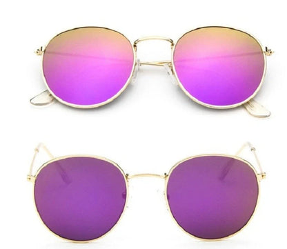 Stylish women's retro sunglasses with round frame and metal finish
