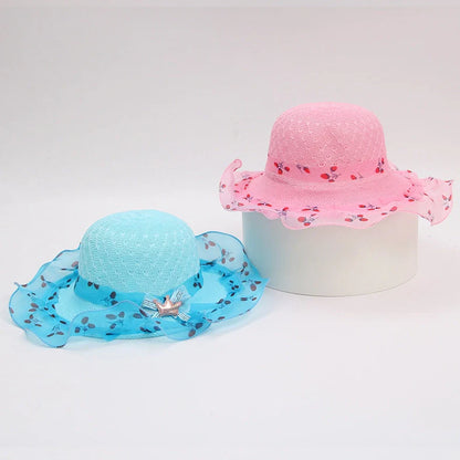 Children's princess straw hat with floral accents and wide brim for sun protection