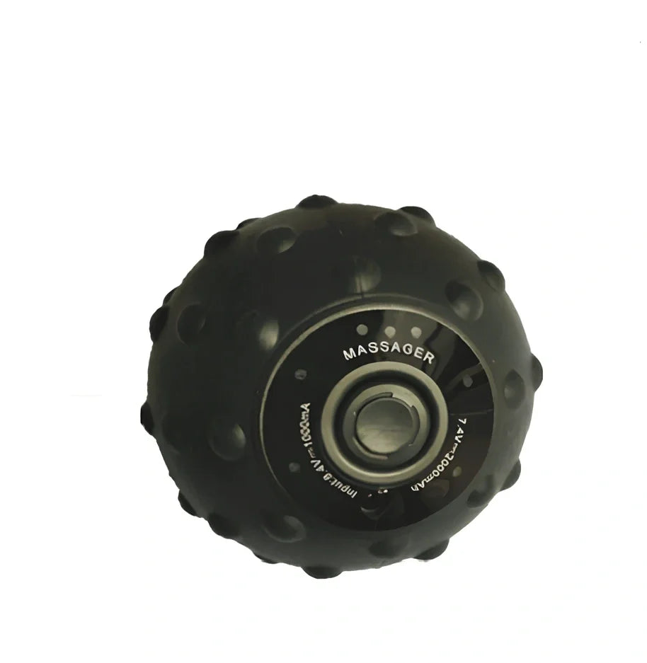 Black vibration massage ball with silicone exterior and four intensity settings for muscle treatment