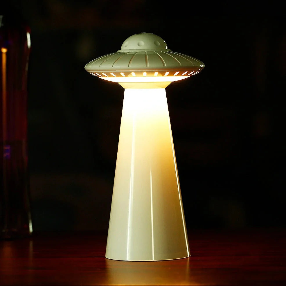 White UFO-shaped desk lamp with USB charging port and push-button switch