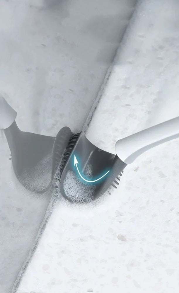 Black silicone bathroom cleaning brush with soft head and curved ergonomic handle for easy grime removal