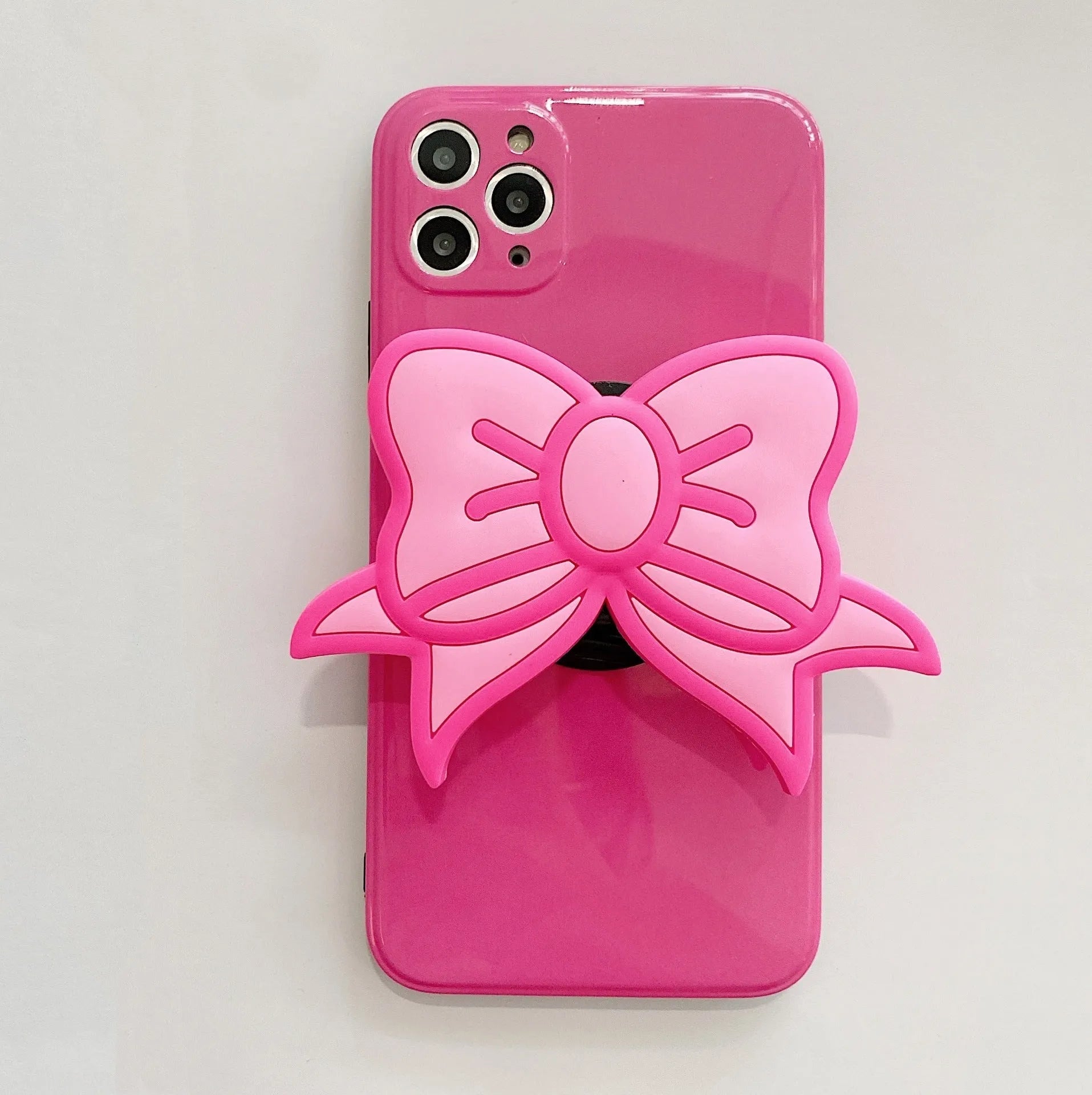 Rose red TPU iPhone case with integrated bow-shaped viewing stand