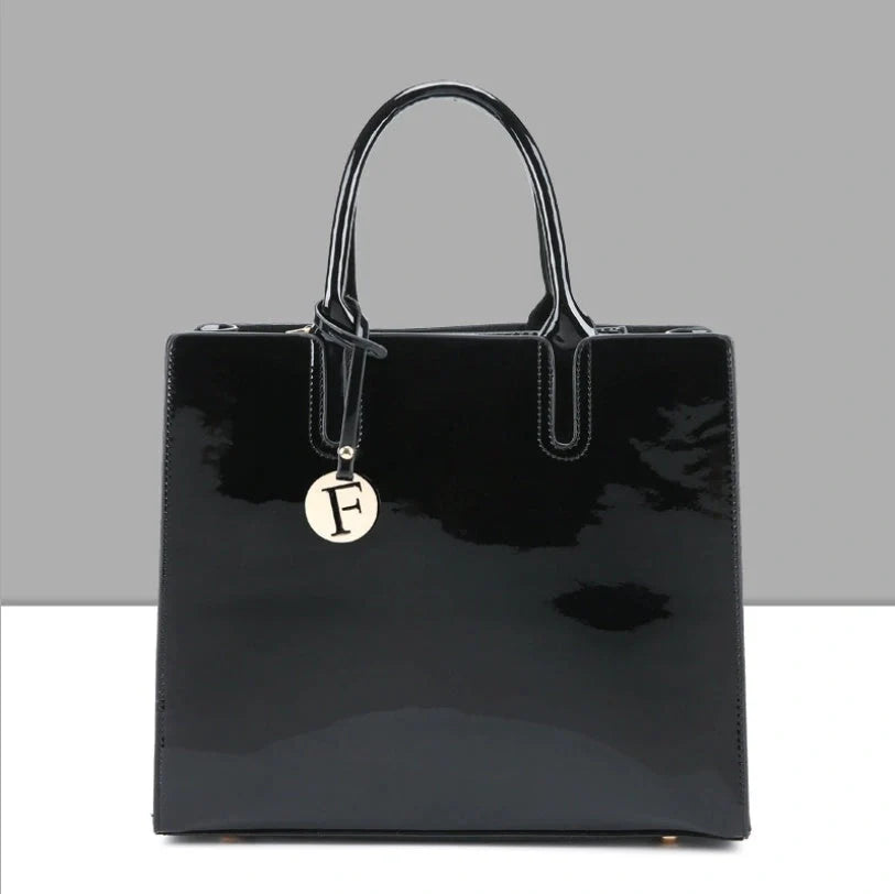 Versatile patent leather shoulder and crossbody handbags in a variety of classic and contemporary colors