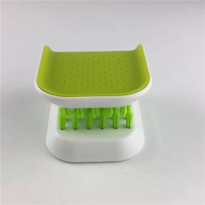 Blue U-shaped knife and cutlery cleaning brush with bristles for kitchen utensil cleaning