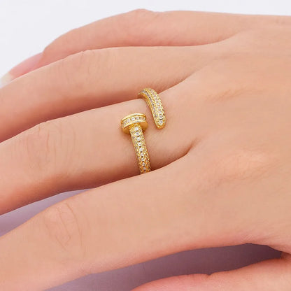Personalized nail ring in gold with geometric metal design and inlaid drill detail, adjustable opening