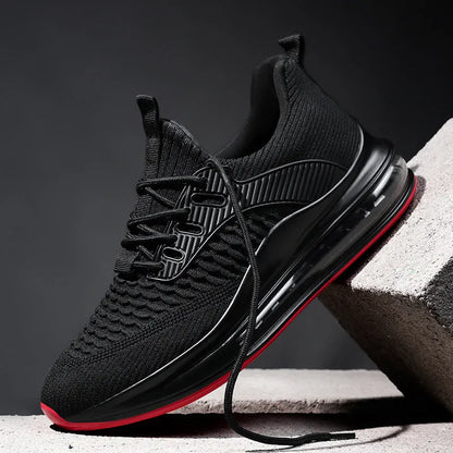Men's black low-top mesh running shoes with lace-up front and platform sole.