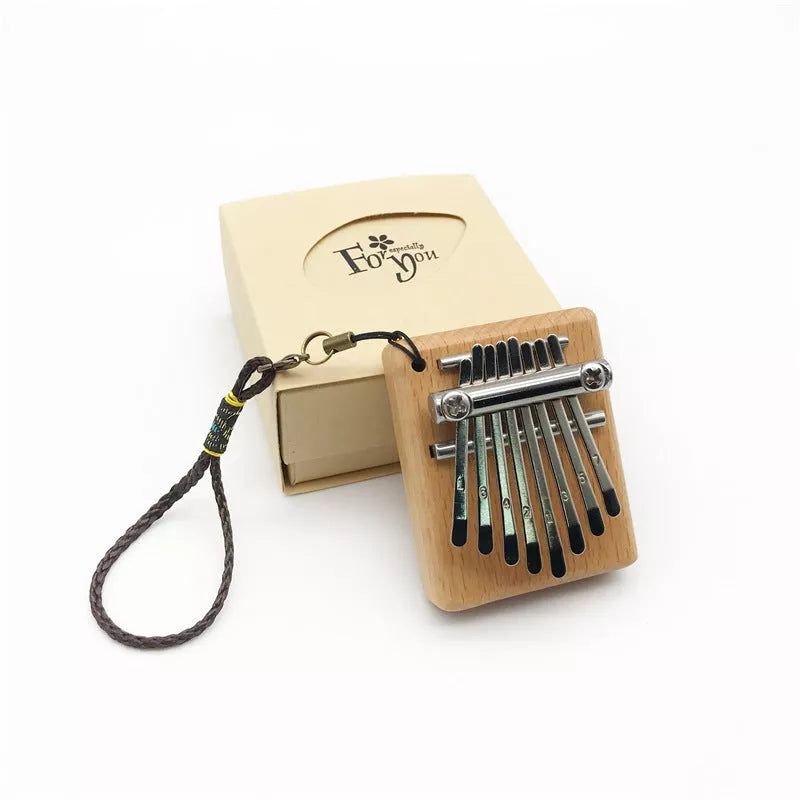 8-note mini thumb piano in beech wood, compact and portable musical instrument