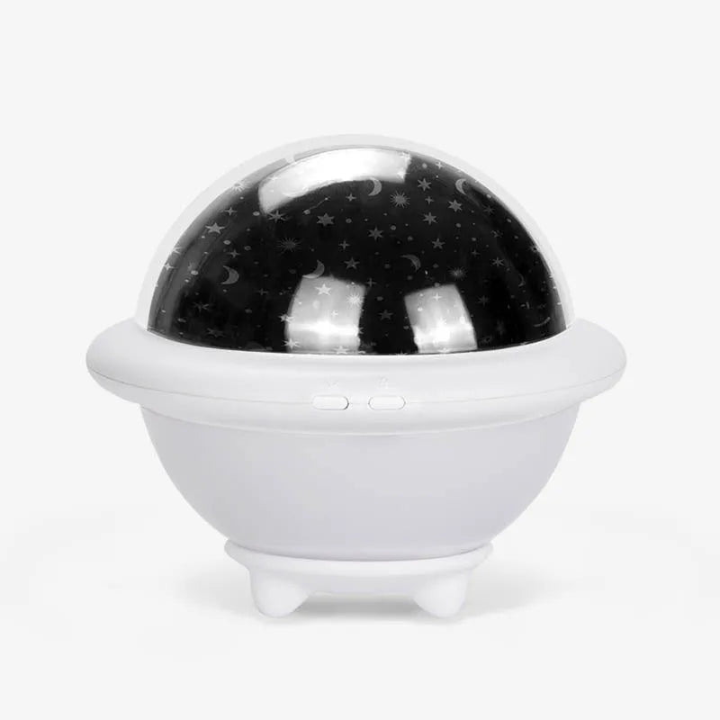 UFO-shaped starry sky light projection lamp in green, pink, or white, measuring 15.1 cm wide