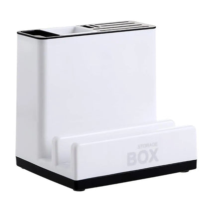 White plastic desktop kitchen knife storage rack with integrated shelf and individual partitions.
