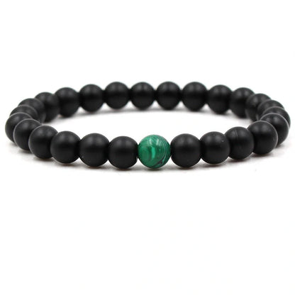 Elegant malachite stone bracelets with unique textures and patterns, perfect for a stylish accessory.