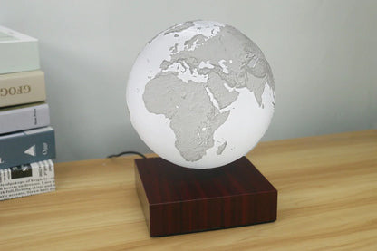 Levitating Earth or Jupiter lamp floating above base with LED illumination