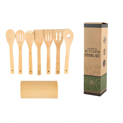 Bamboo spatula set with square bamboo holder containing various cooking utensils with ergonomic handles