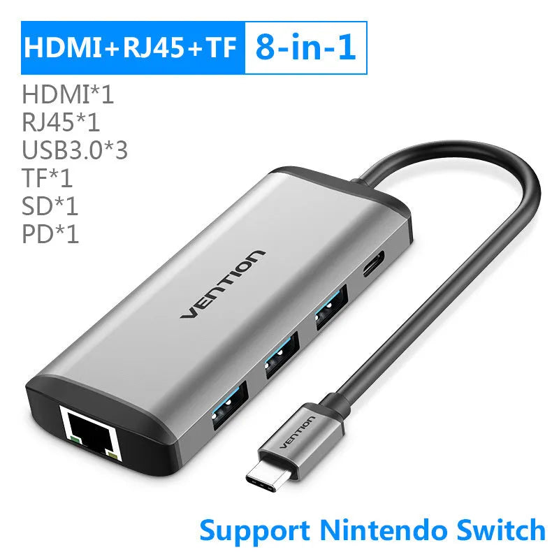 Deep grey Type-C to HDMI, USB, Ethernet, and card reader hub with 0.15m cable on a laptop