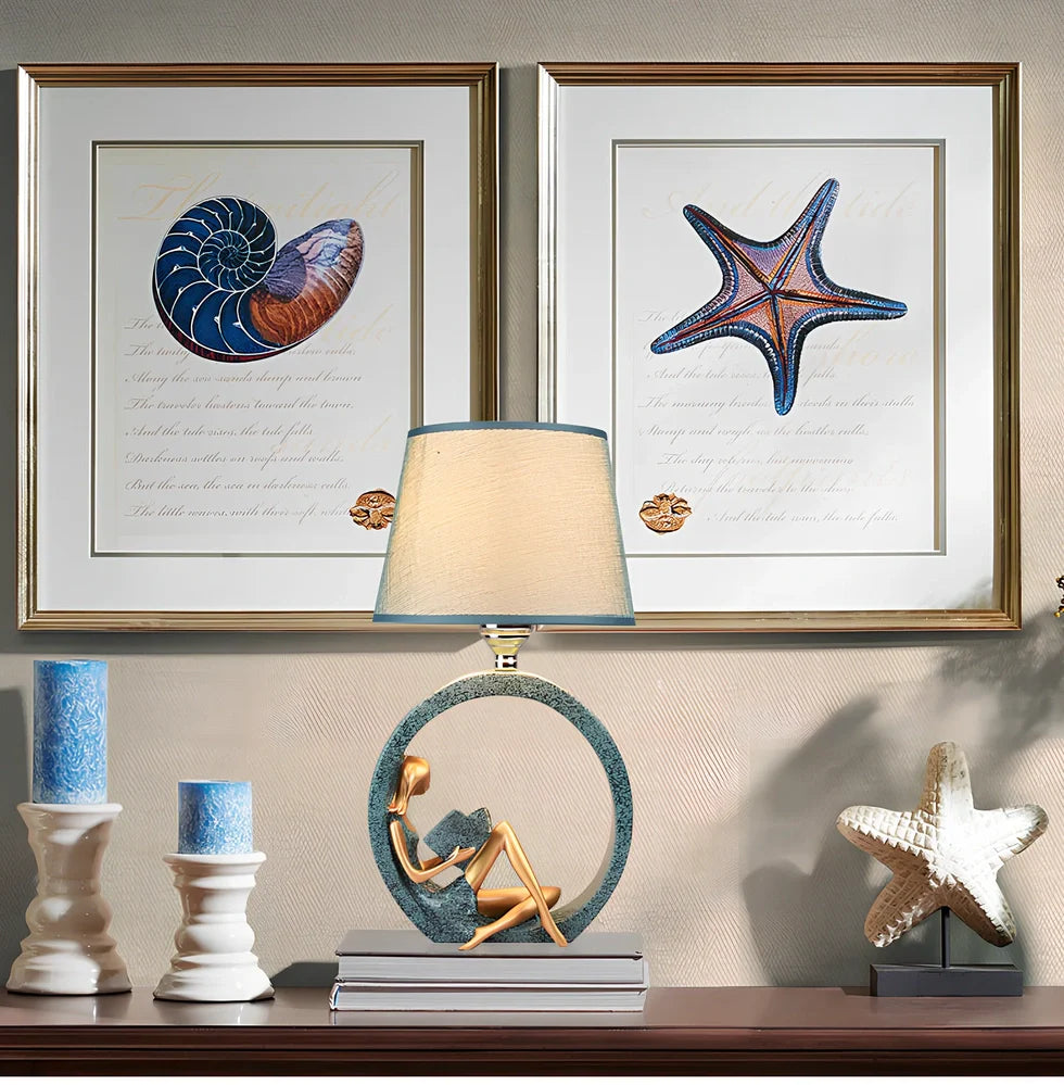 Blue reading night light with resin base and cloth shade measuring 20x39.8cm