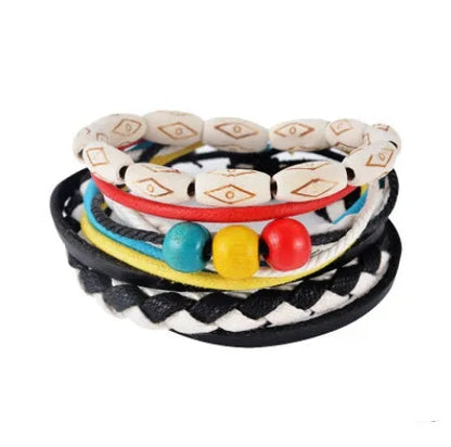 Hand-woven brown leather bracelet with wooden beads and rope detailing on a wrist.