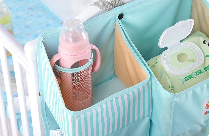 Universal baby crib hanging storage bag in various colors with multiple pockets