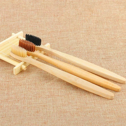 Organic bamboo toothbrush with 17.5cm ergonomic handle and charcoal-infused bristles for sustainable dental care