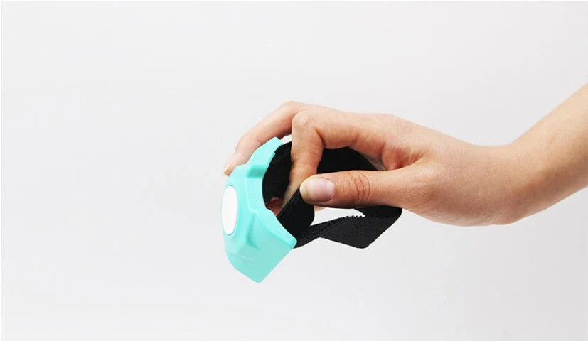 Magnetic sports water bottle with adjustable silicone grip that securely attaches to metal surfaces for hands-free hydration during workouts and outdoor activities