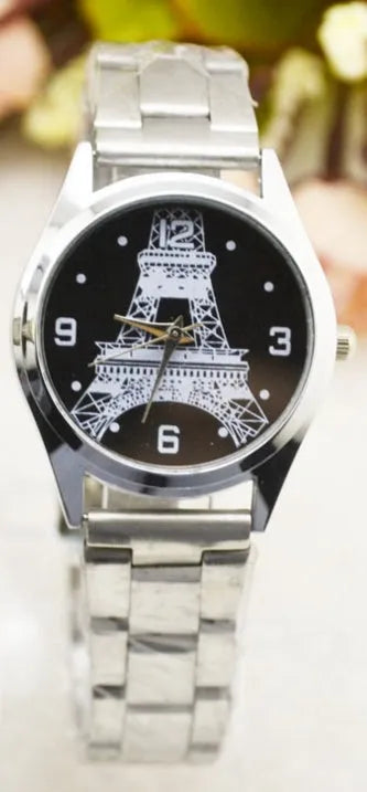 Silver tone Eiffel Tower wrist watch with round dial and luminous hands