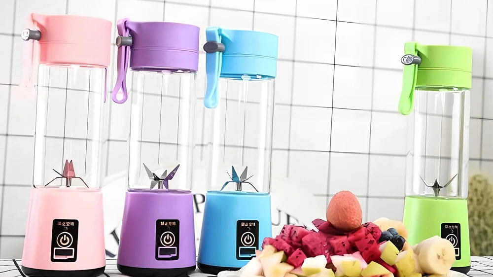 Portable blender with 400ml transparent cup, USB charging port, and 6 stainless steel blades