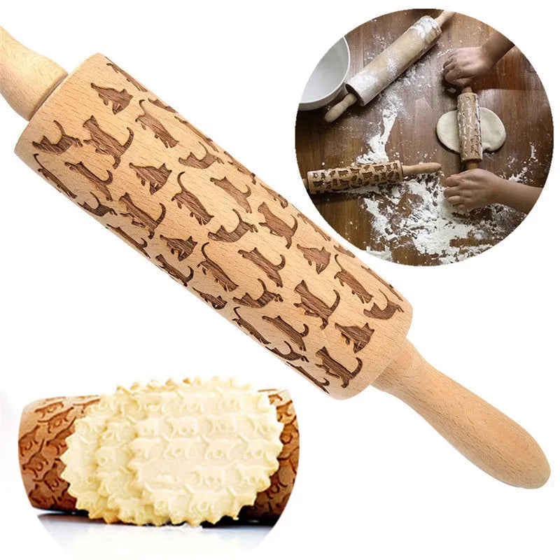 Wooden rolling pin with engraved Christmas patterns including reindeer and snowflakes on a 45cm long barrel.