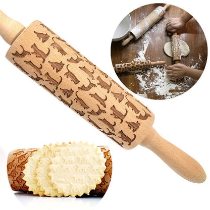 Wooden rolling pin with engraved Christmas patterns including reindeer and snowflakes on a 45cm long barrel.