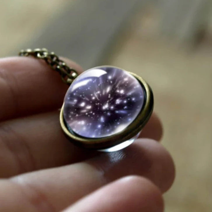 Mesmerizing double-sided galaxy pendant necklace in various celestial patterns and colors