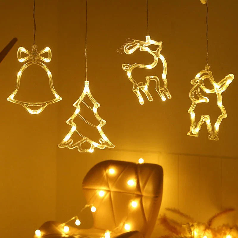 Decorative battery-powered LED chandelier lights with holiday-themed designs like Santa, snowmen, and stars