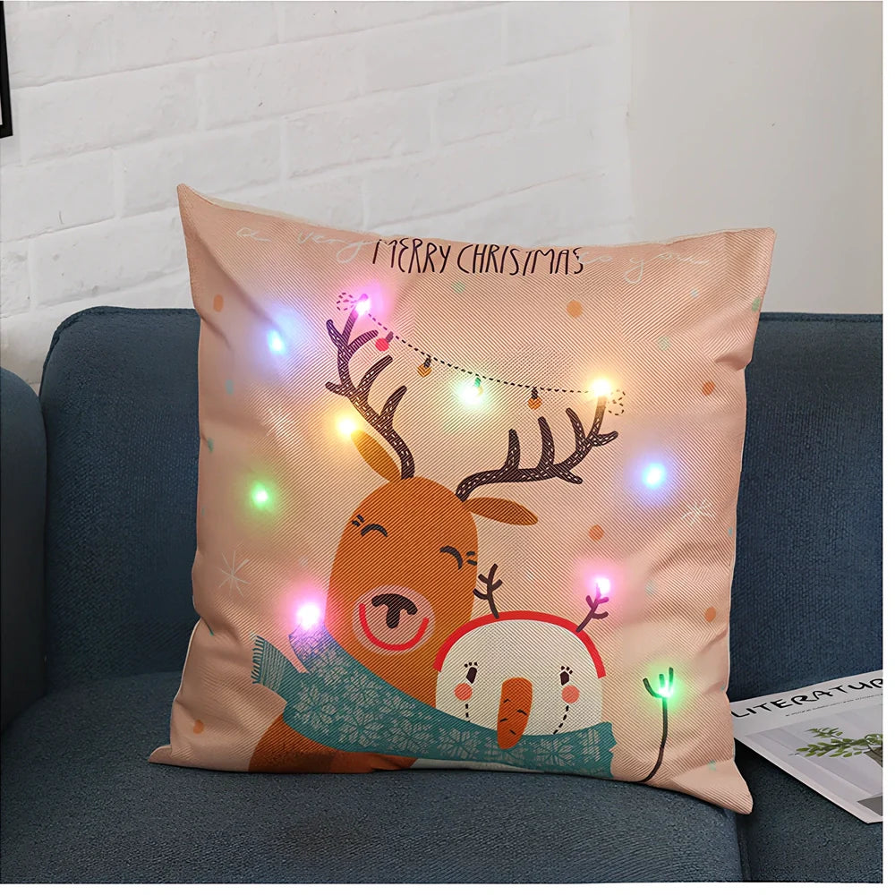 45cm square Christmas cushion with linen cover and battery-operated lighting showing festive design