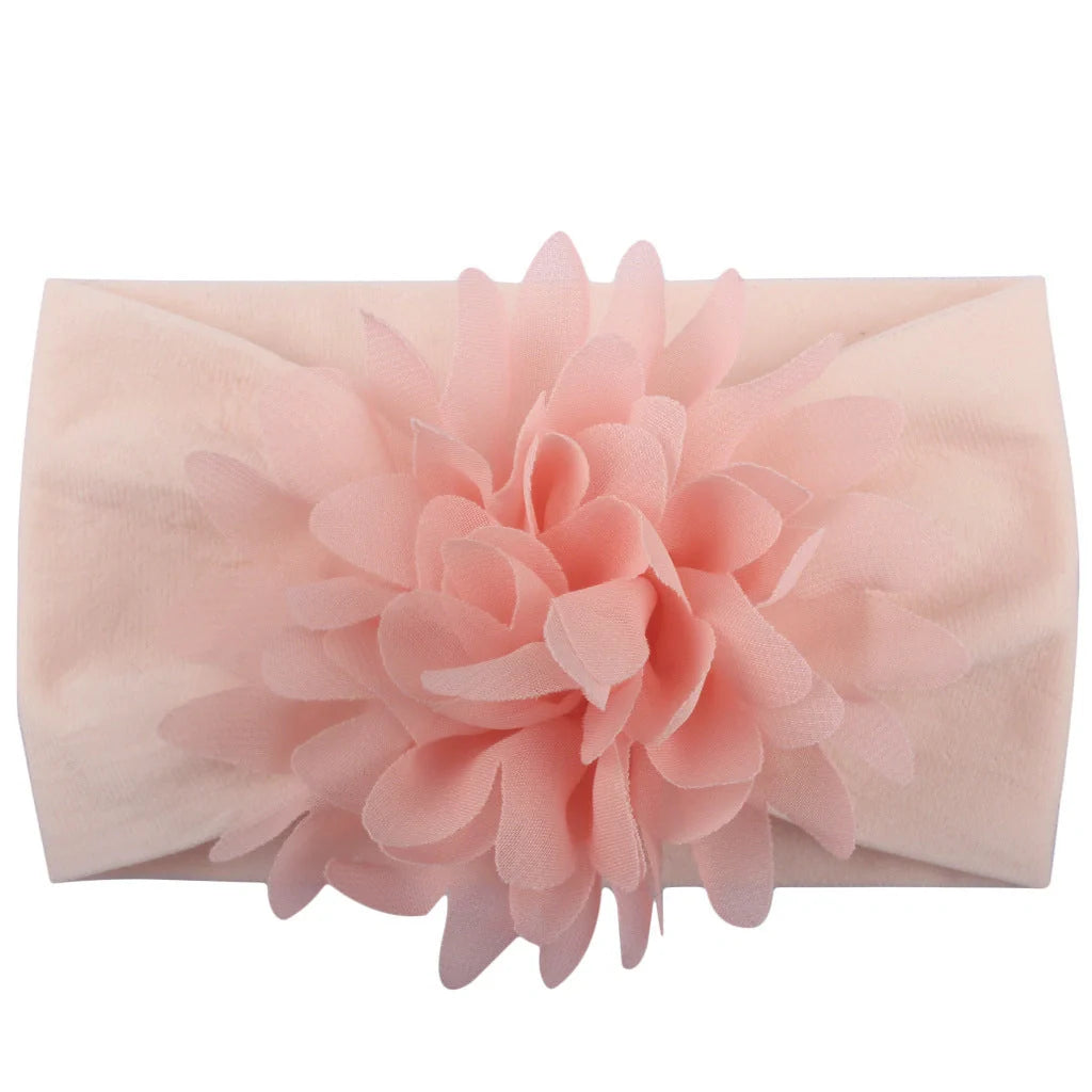 Adorable chiffon flower baby headband for your little princess, available in multiple colors.