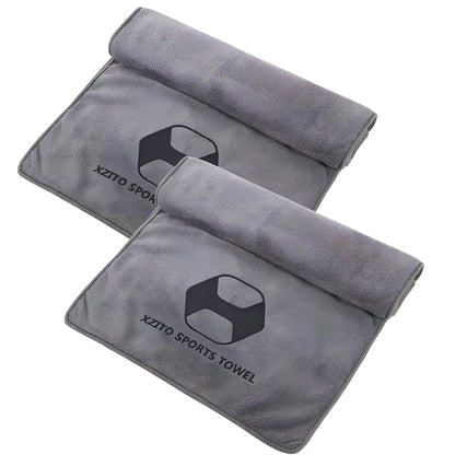 Blue sports sweat absorbent towel with 100x30cm dimensions and polyester-nylon fabric for athletic use
