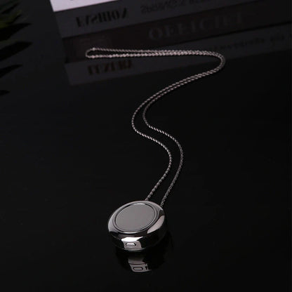 Portable negative ion air purifier necklace in blue, white, and silver