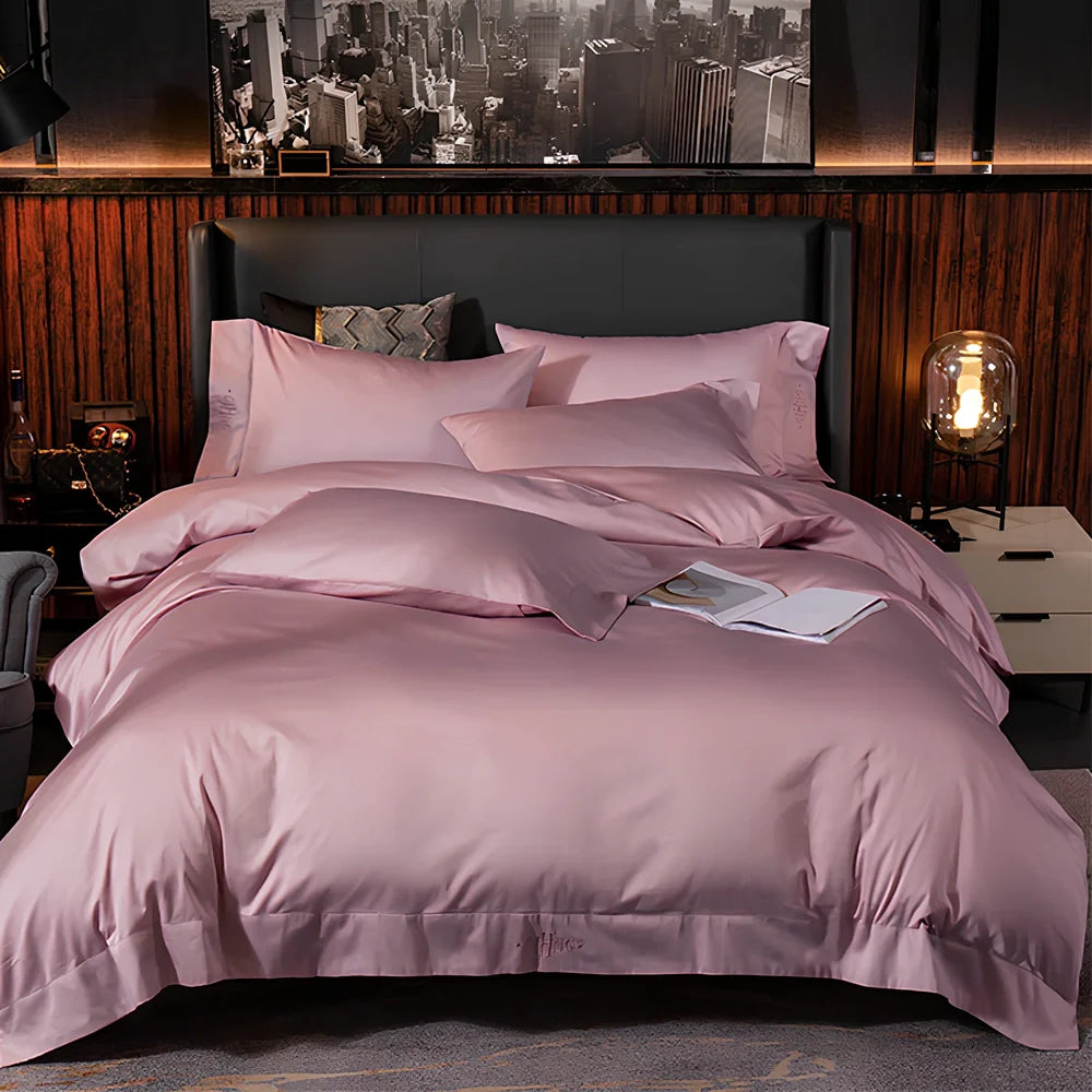 Four-piece quilted cotton bed set in royal blue, showing 200x230 cm cover and 48x74 cm pillowcases for 1.5m bed