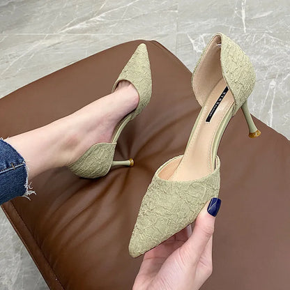 Black pointed-toe stiletto high heel shoes with a 6-8cm heel on a plain background.