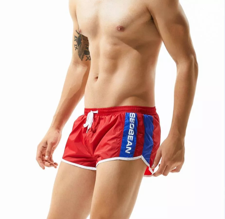 Men's lightweight polyester shorts for summer sports in various colors
